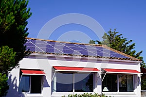 Solar photovoltaic panels on a house roof