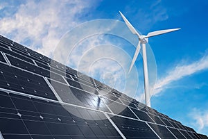 Solar photovoltaic panels and wind turbines. Alternative energy production and renewable power generation concept