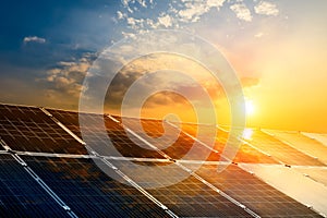 Solar power panels and natural landscape in sunny summer