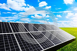 Solar power panels and natural landscape in sunny summer