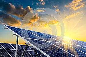 Solar power panels and natural landscape in sunny summer