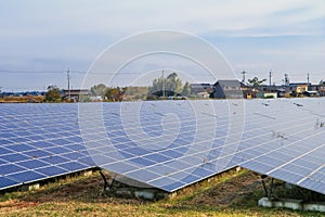 Solar power panels ,Photovoltaic modules for  innovation green energy for life with blue sky background