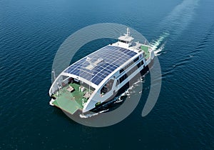 Solar powered ferry on calm water