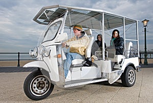 Solar powered tuc tuc at the beach