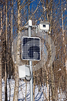 Solar-powered webcam mounted on a metal pole