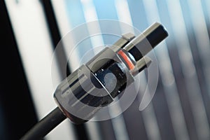 Solar PV Connectors of solar photo voltaic panel system. MC4 socket connector of solar cell panel. Electrical cables inside solar