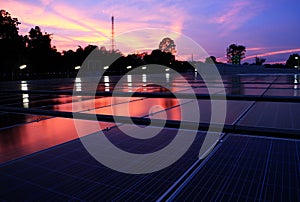 Solar PV Rooftop at Dawn Red Cloud Sky