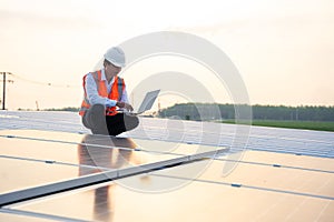 The solar rooftop(solar panel) with engineers check the operation of the system.