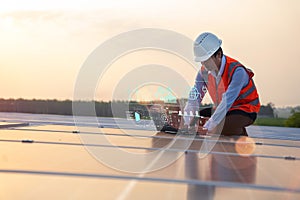 The solar rooftop(solar panel) with engineers check the operation of the system.