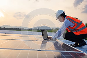 The solar rooftop(solar panel) with engineers check the operation of the system.