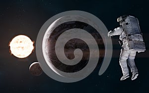 Solar system. Earth, moon and astronaut on background of the sun. 3D Render