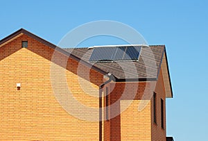 Solar water heating system on bitumen roof of the house.