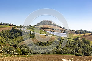 Solarcells on the hills of the village of Montedinove Italy