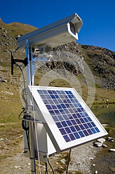 Solarpanel and webcam in the alps photo
