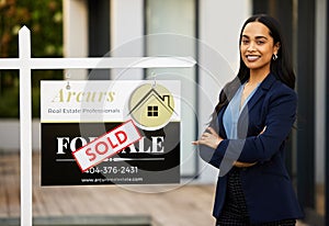 Sold board, realtor woman and portrait with arms crossed for home investment, property sale and agency success. Happy