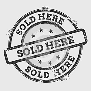 Sold here rubber stamp isolated on white.