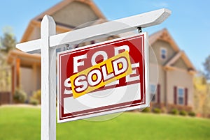 Sold Home For Sale Real Estate Sign in Front of New House