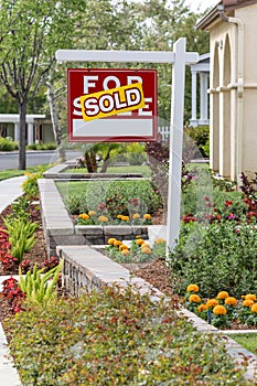 Sold Home For Sale Real Estate Sign in Front of New House