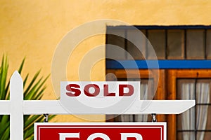 Sold Home For Sale Real Estate Sign and House