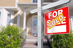 Sold Home For Sale Sign in Front of New House.