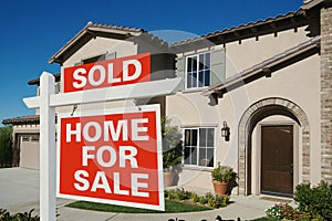 Sold Home For Sale Sign in Front of New House