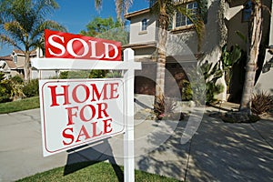 Sold Home For Sale Sign & Home