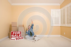 Sold Real Estate Signs, Boxes and Woman on Phone
