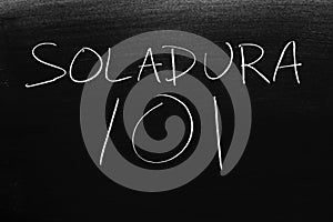 Soldadura 101 On A Blackboard. Translation: Welding 101 photo