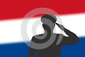 Solder silhouette on blur background with Netherlands flag