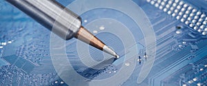 Soldering electronic components onto the PCB. Electronics repair and digital technology
