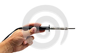 Soldering iron in his hand
