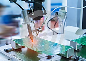 soldering iron tips of robotic system for automatic point soldering for printed and assembly electric circuit board PCB