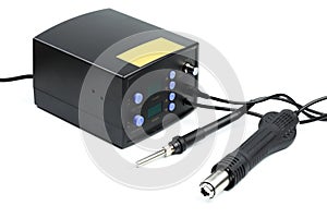 Soldering station with LED display, heating control regulator, with hot air gun and soldering iron.  on a white background