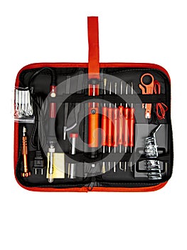 A soldering toolset in a black case isolated in a white background