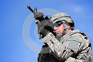 A soldier aiming