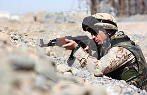 A soldier aiming