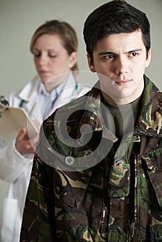 Soldier Being Assessed By Doctor