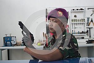 Soldier With Bionic Hand In Indonesia