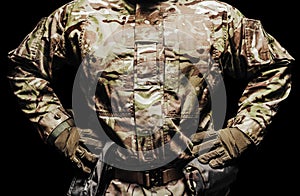 Soldier in camouflaged tunic and tactical belt