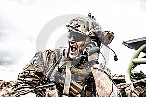 Soldier communicating with command during battle