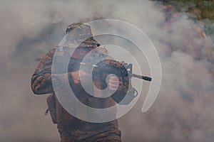 A soldier fights in a warforest area surrounded by fire