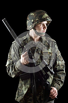 Soldier grasping a gun