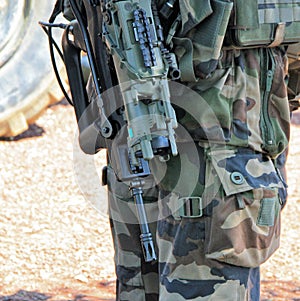 Soldier with a gun ready for combat