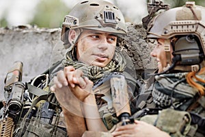 Soldier and his wife at the battlefield