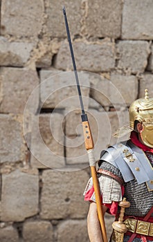 Soldier holding the pilum, ancient roman army javelin