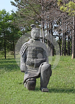 Soldier made from Tera Cota Kneeling down photo