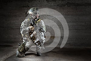 Soldier with mask rifle and backpack