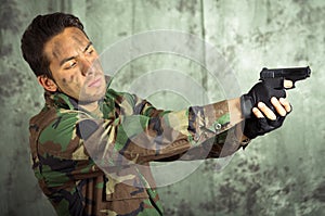 Soldier militar latin man pointing a gun