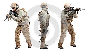 Soldier in military equipment with a gun on a white background, a commando in uniform with a gun to aim and attack