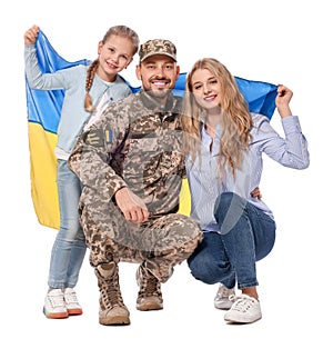 Soldier in military uniform reunited with his family and Ukrainian flag on white background